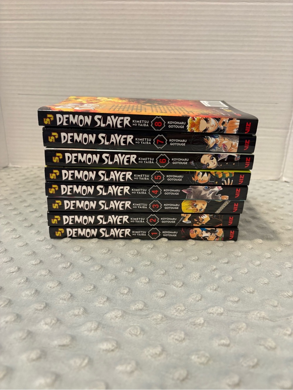 Demon Slayer Manga Volumes Stack - Black & Color Spine Art Volumes 1-8